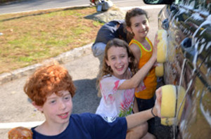 Youngsters step up to help wash cars!